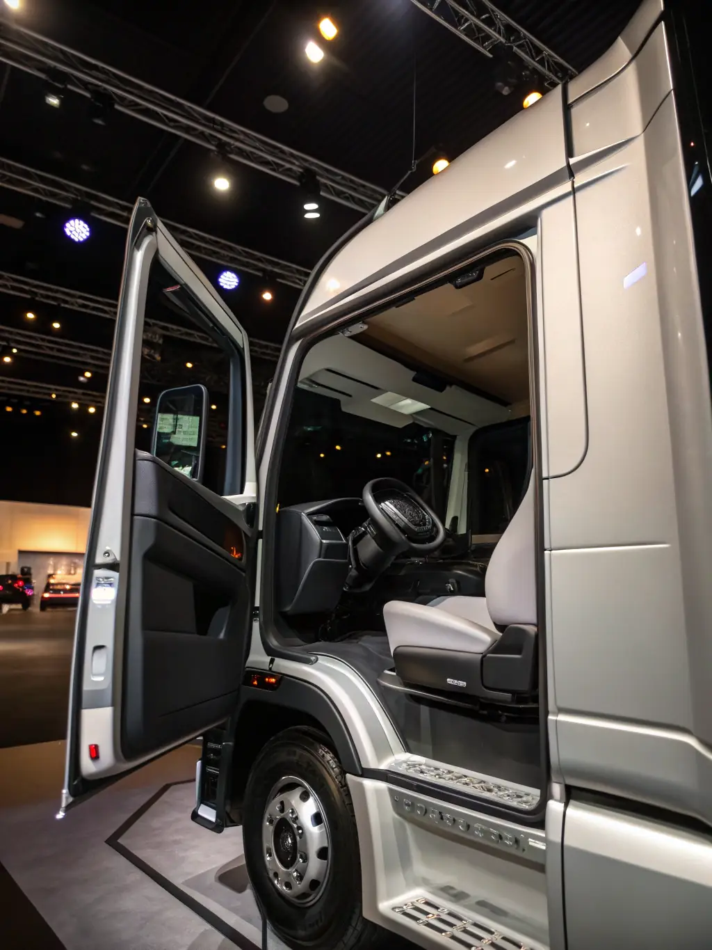 An image of a brand new semi-truck cab interior, focusing on the comfort and technology available to drivers, symbolizing the quality of jobs available through FleetHire.